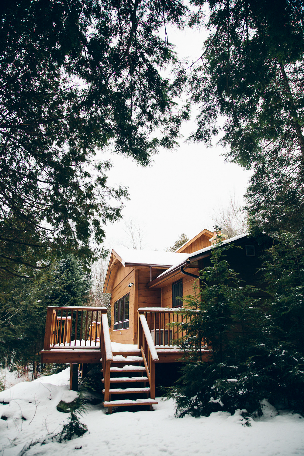 Canning lake deck on log home winter